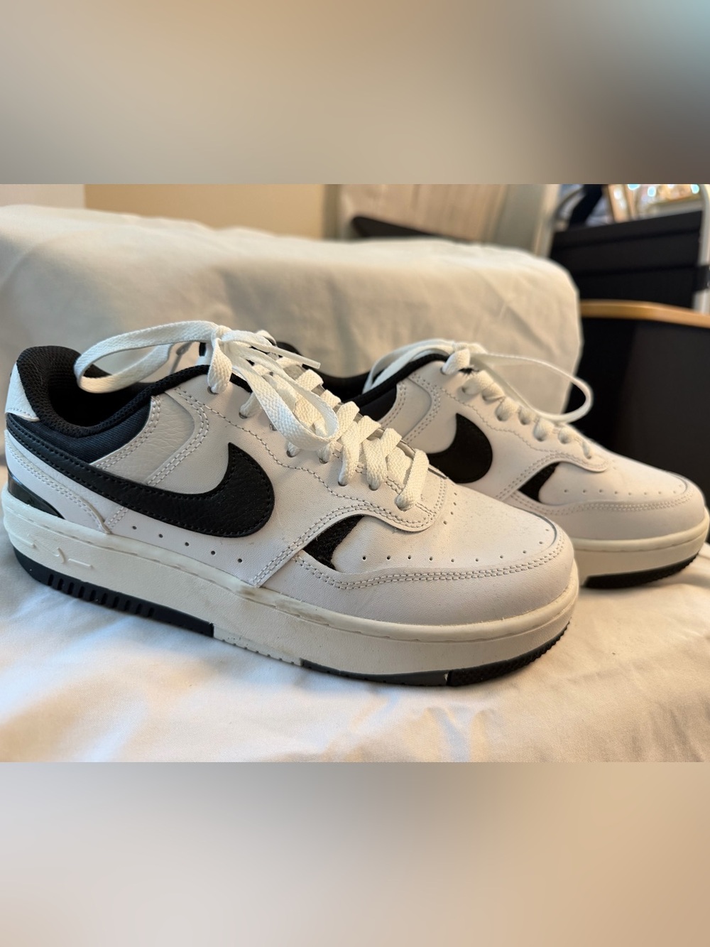 Nike Kids White Sneakers with Black Swoosh